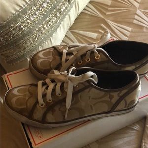Gently worn Authentic Coach emblem sneakers.
